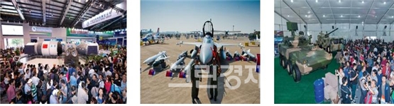 ▲제10회에어쇼전시품:좌측부터선저우(神舟)-7호우주비행선,젠홍(殲轟,JH)-7A전폭기,보병수송장갑차