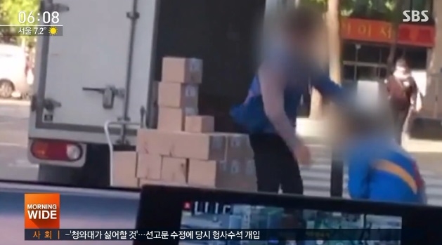 택배기사 폭행 동영상을 두고 누리꾼들의 갑론을박이 벌어지고 있다. 사진=SBS