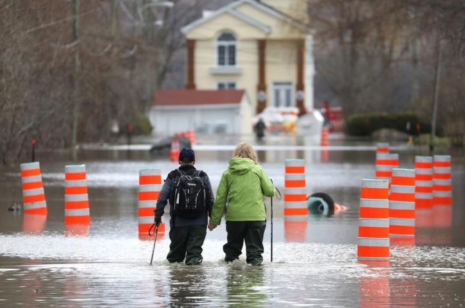 오타와 짐 왓슨 시장은 25일(현지 시간) 상승하고 있는 오타와 강 수위의 범람 위험과 26일 예상되는 폭우에 대응해 비상사태를 선포했다. 사진은 24일 퀘벡. 자료=로이터