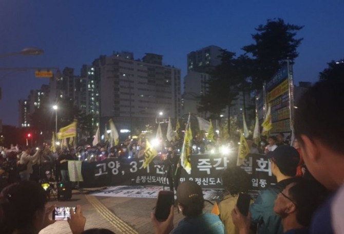 12일 '3기 신도시 철회' 집회에 나선 일산·운정신도시 연합회 주민들. 사진=뉴시스