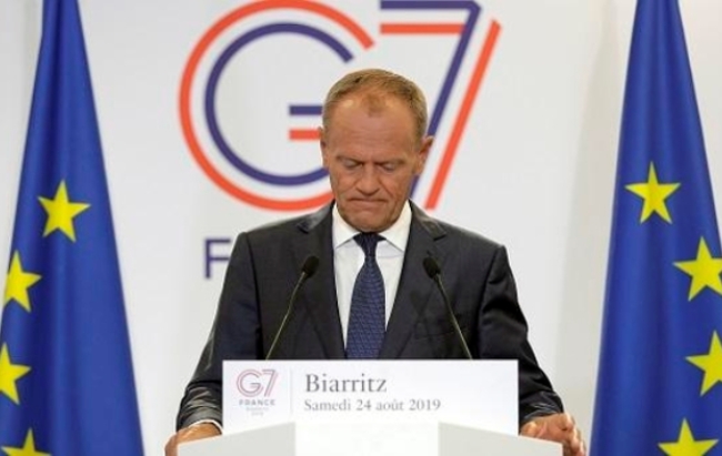 G7 정상회의에 참가한 투스크 EU 상임의장이 24일(현지시간) 기자회견을 하고 있다.