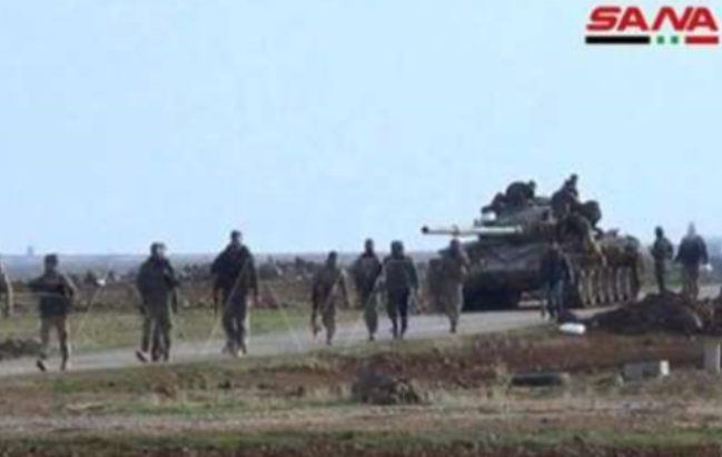 시리아 북부 거점 만비즈로 진군하고 있는 시리아 정권군.