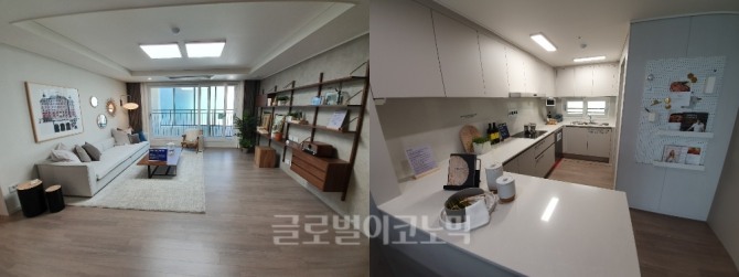 'e편한세상 홍제 가든플라츠' 84타입 거실(왼쪽)과 주방 모습. 사진=김하수기자