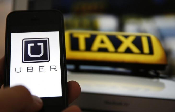 스마트폰을 기반으로 한 미국의 승차 공유 서비스 우버(Uber)는 지난달 27일 민간 고용업체에 예약 및 파견 소프트웨어를 판매하는 영국 택시 관련 기술업체 오토캡을 인수한 것으로 알려졌다. 사진=로이터