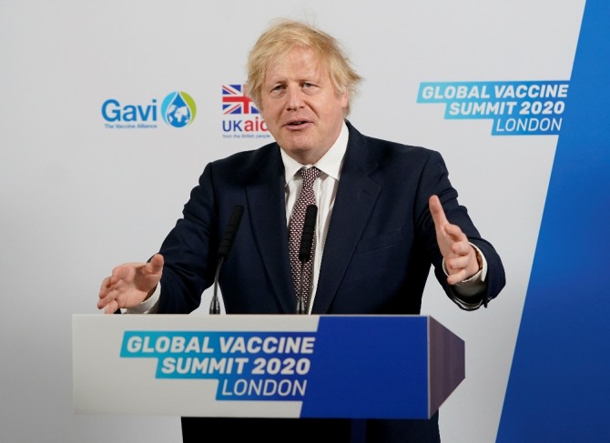 보리스 존슨 영국 총리가 4일(현지시간) '2020 백신 화상 정상회의' 개막연설을 통해 국제사회에 최빈국의 전염병 피해를 예방하기 위한 백신 개발에 동참해 줄 것을 촉구하고 있다. 신화/뉴시스