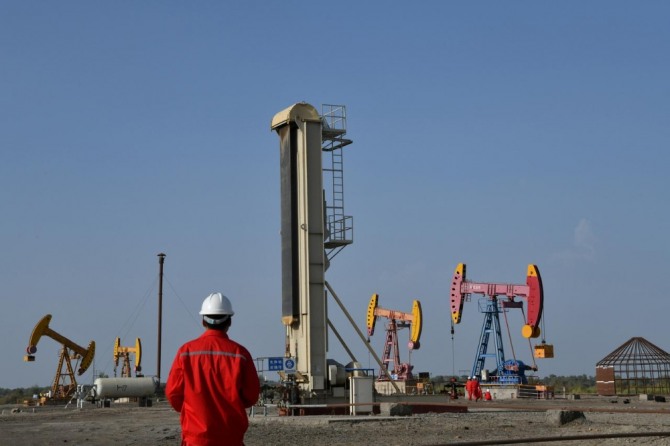 국제에너지기구(IEA)가 올해 글로벌 석유수요 전망을 하향 조정했다. 사진=로이터