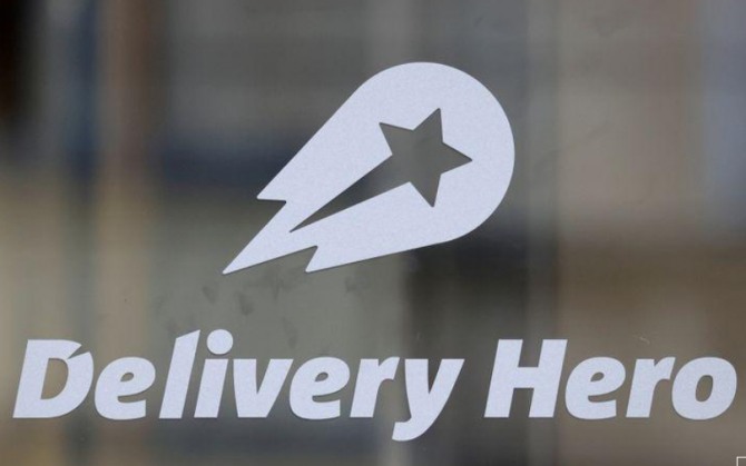 독일 베를린의 본사에 붙어 있는 딜리버리 히어로(Delivery Hero) 로고   사진=로이터