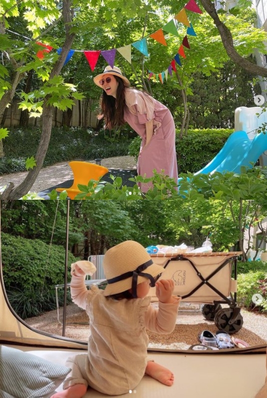배우 최지우가 12일 2살 홈캠핑을 하고 있는 2살 딸의 뒷모습을 공개했다. 사진=최지우 인스타그램 