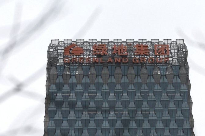베이징에 있는 건물에서 그린랜드의 로고를 달려있다. 사진=로이터