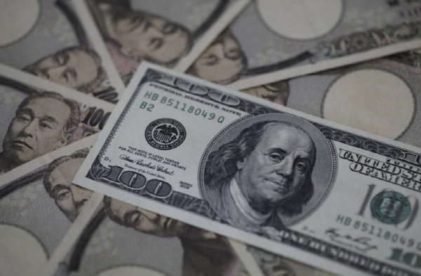 미국 100달러와 일본 만엔 지폐. 사진=로이터