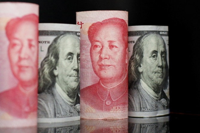 중국 위안화가 미국 달러의 패권에 도전하고 있다. 그러나 전문가들은 달러에 대한 도전은 쉽지 않을 것으로 전망했다. 사진=로이터