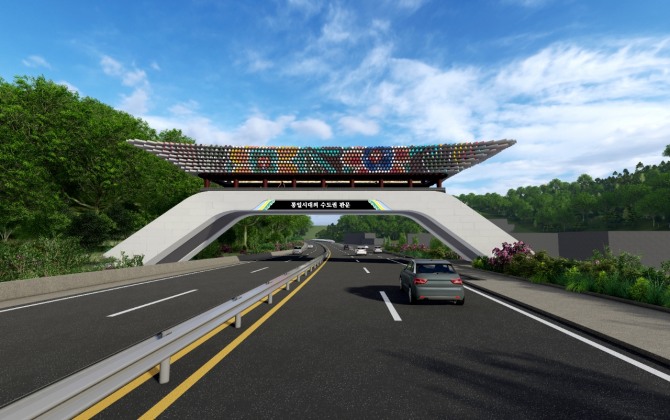 강화대교 정면에 강화군 관문이 우뚝 서 있다.  