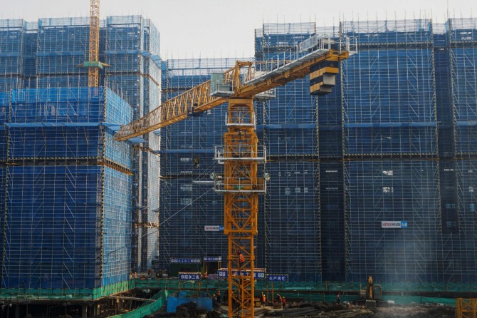 홍콩 증시에 상장된 중국 중소은행 주식 거래가 뜸하다. 중국의 건설 현장. 사진=AFP/연합뉴스