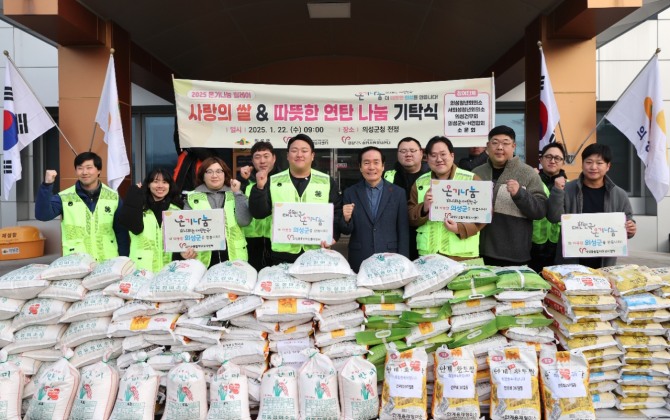 22일 의성전통시장 설 명절맞이 장보기행사에 맞춰 겨울철 에너지절약 캠페인을 실시했다. = 의성군