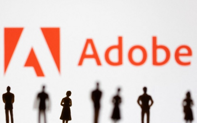 2022년 6월 13일에 촬영된 이 사진에 표시된 Adobe(어도비) 로고 앞에 그림이 보인다. 사진=로이터