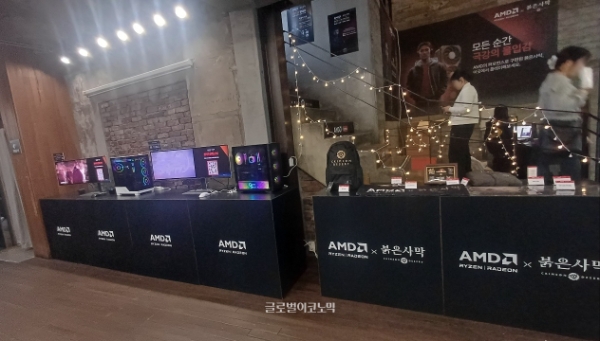 팝업스토어 1층에 전시된 AMD 제품군과 붉은사막 굿즈들. 사진=이원용 기자