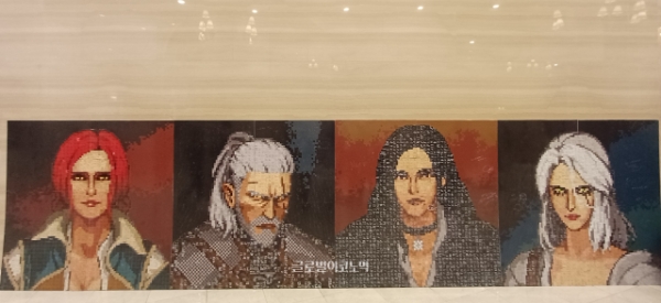 평화의 전당 한켠에는 위쳐 3를 상징하는 네 캐릭터의 초상화도 전시됐다. 사진=이원용 기자