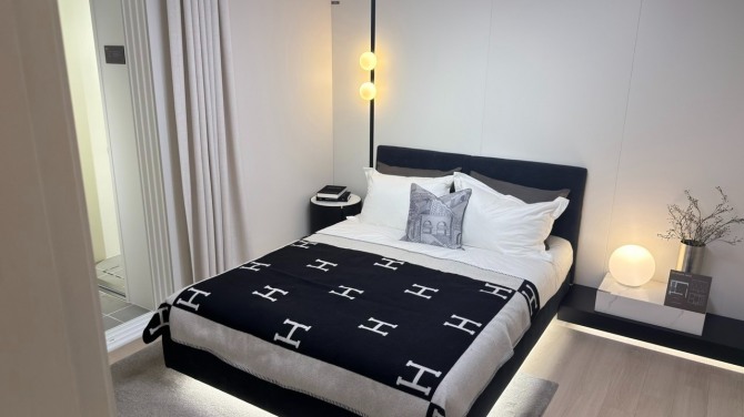 포스코이앤씨는 27일 서울시 용산구 한강로3가 하우징 갤러리에 더샵 신길센트럴시티의 견본주택을 열고 일반분양에 들어갔다. 사진은 견본주택에 마련된 전용면적 59㎡A타입 침실. 사진=최재민 기자